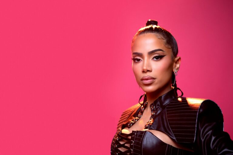 Press shot of Anitta against a pink background