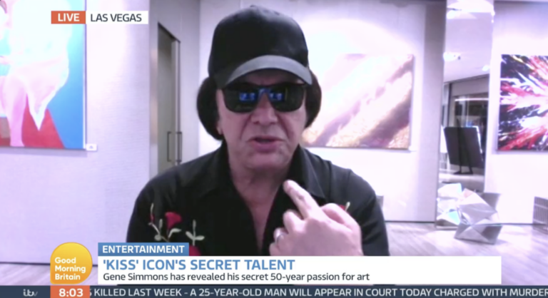 Gene Simmons appears on ITV's Good Morning Britain wearing a black cap and sunglasses