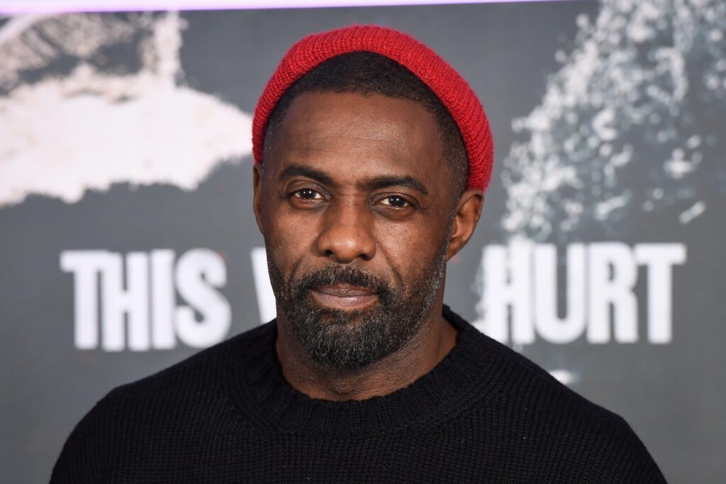 Idris Elba poses at a film premiere