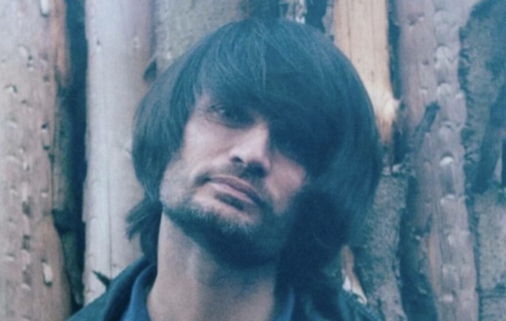 Jonny Greenwood poses