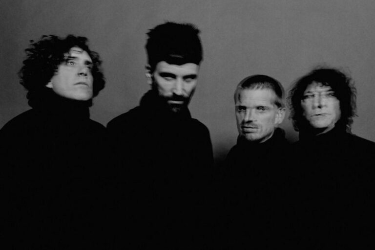 Kasabian pose for a black and white press picture