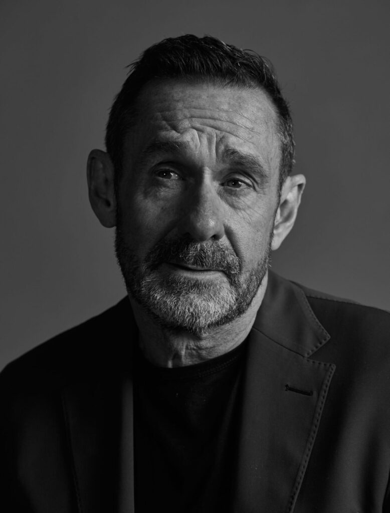Paul Mason poses for Rolling Stone