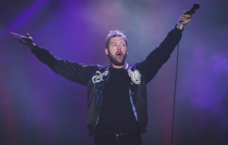 Kasabian's Tom Meighan performs live