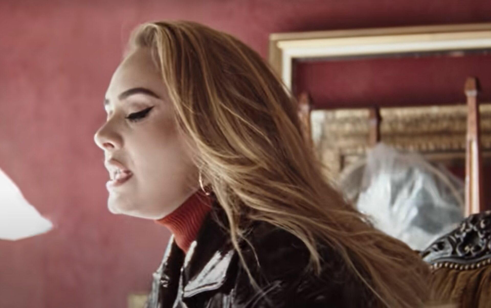 Adele performs in the 'Easy On Me' video