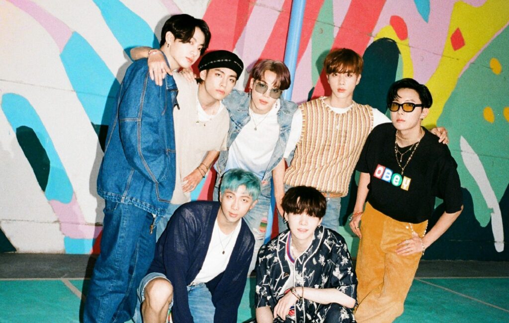 The members of BTS pose for a press shot