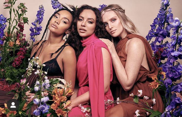 Little Mix surrounded by flowers