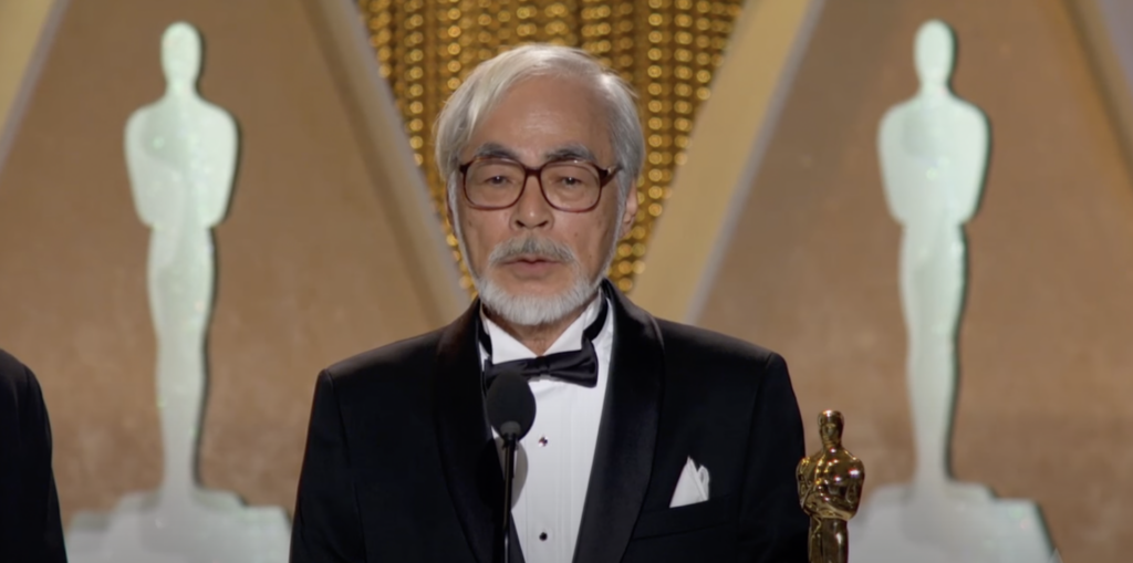 Screenshot of Miyazaki accepting an honorary award at the 2014 Governors Awards.