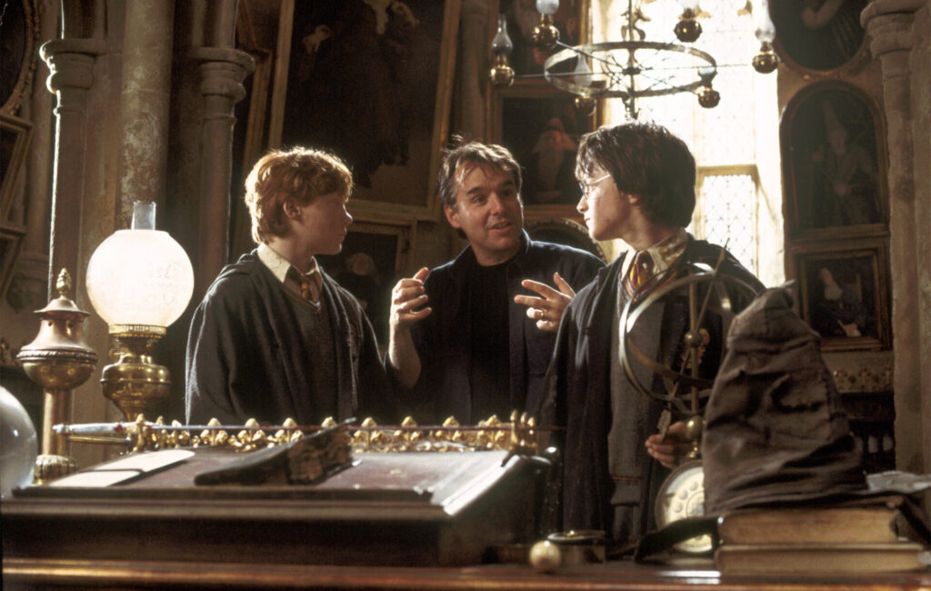 Chris Columbus on the Harry Potter set with Rupert Grint and Daniel Radcliffe