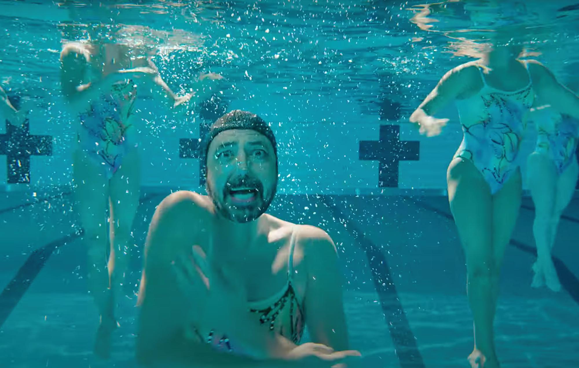 Still from the music video for 'Loves Dies Young'