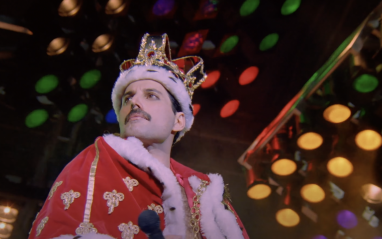 Still of Freddie Mercury in the music video for his song, The Great Pretender