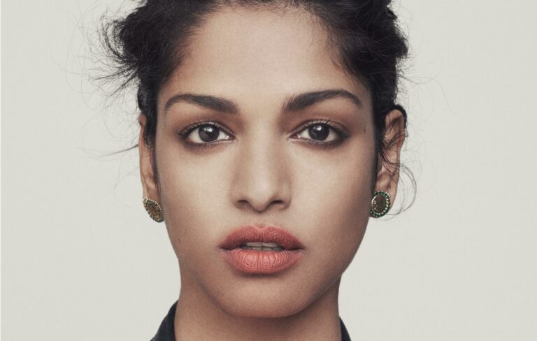 M.I.A. posing front-on in a portrait photo