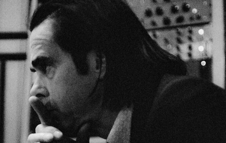 Nick Cave in a black and white studio