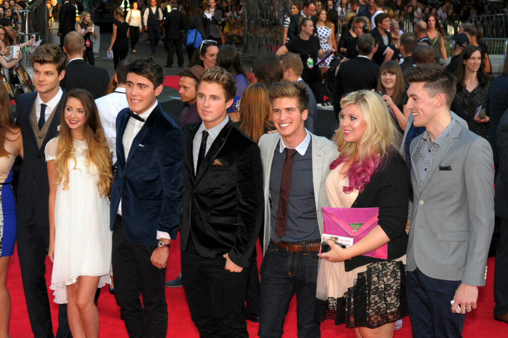 Members of the Brit Crew on the red carpet in 2013