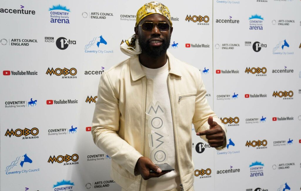 Ghetts poses live at the MOBO Awards 2021