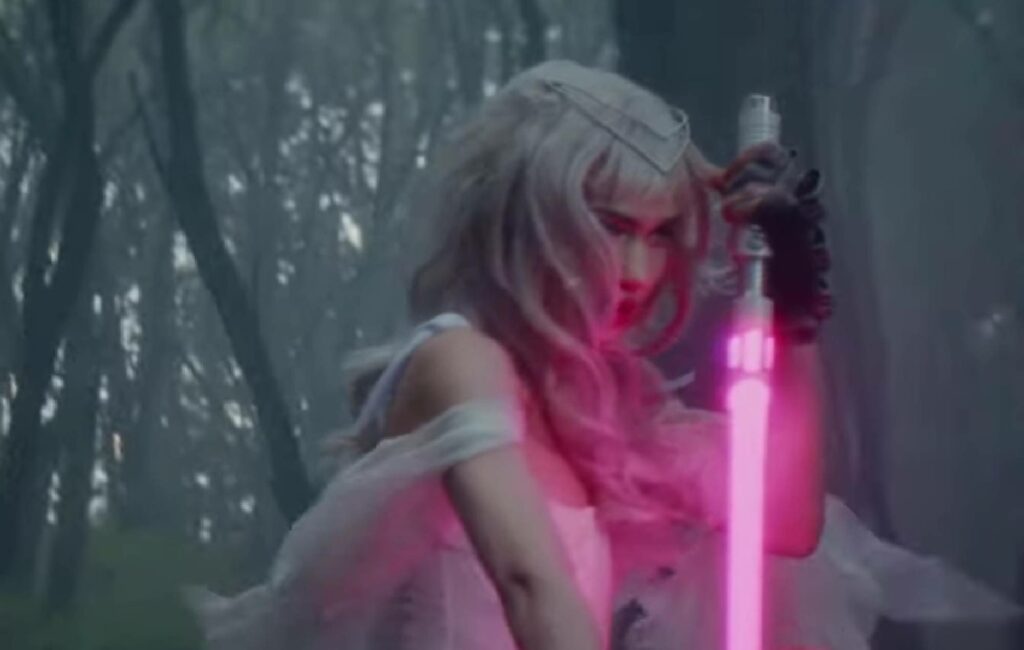 Grimes Battles a Dark King in New 'Player of Games' Music Video