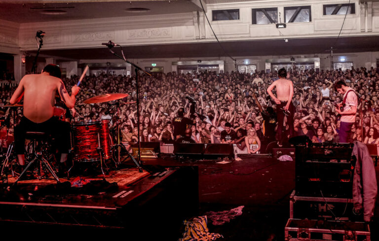 Fat White Family perform live in front of a sold-out crowd at London's Brixton Academy