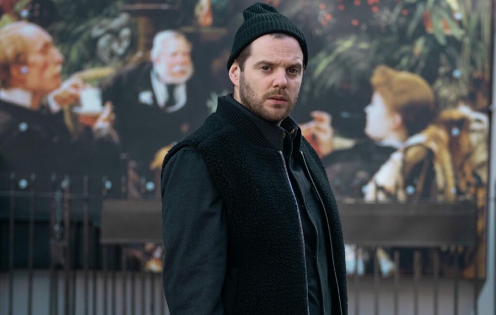 Mike Skinner poses for a press shot
