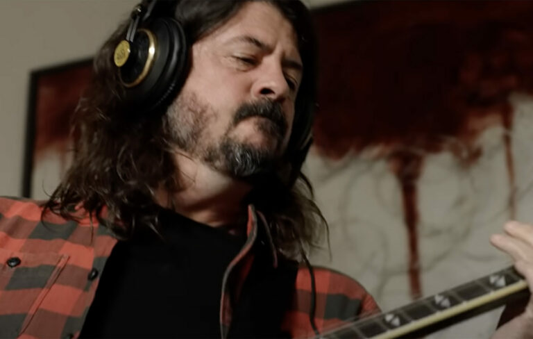 Foo Fighters frontman Dave Grohl playing guitar in Studio 666