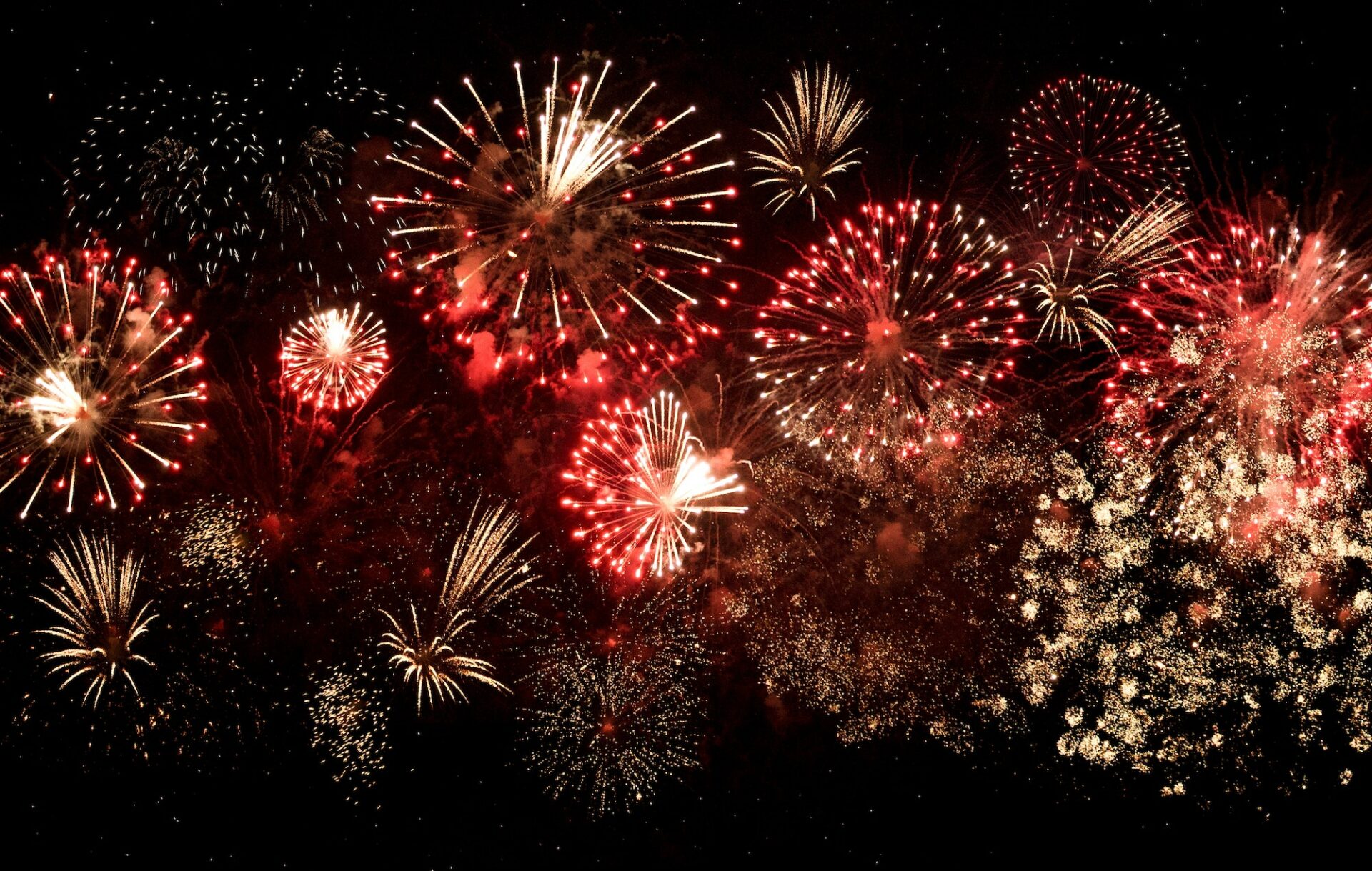 Red fireworks in a dark sky