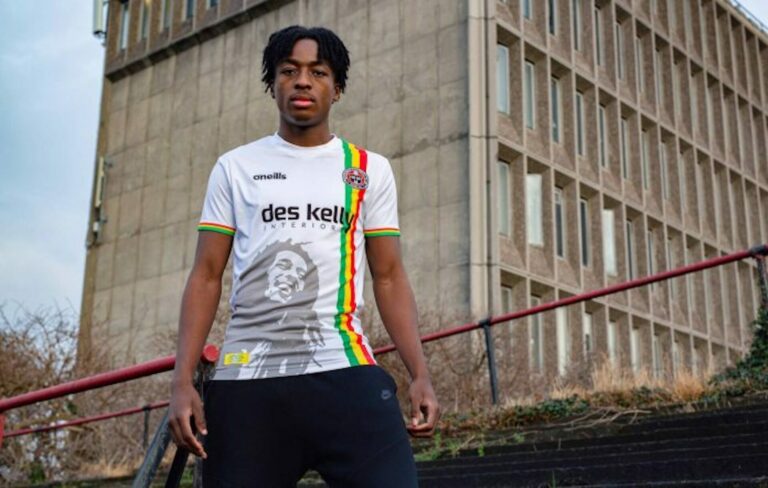 A model wears the Bohemians Bob Marley away shirt