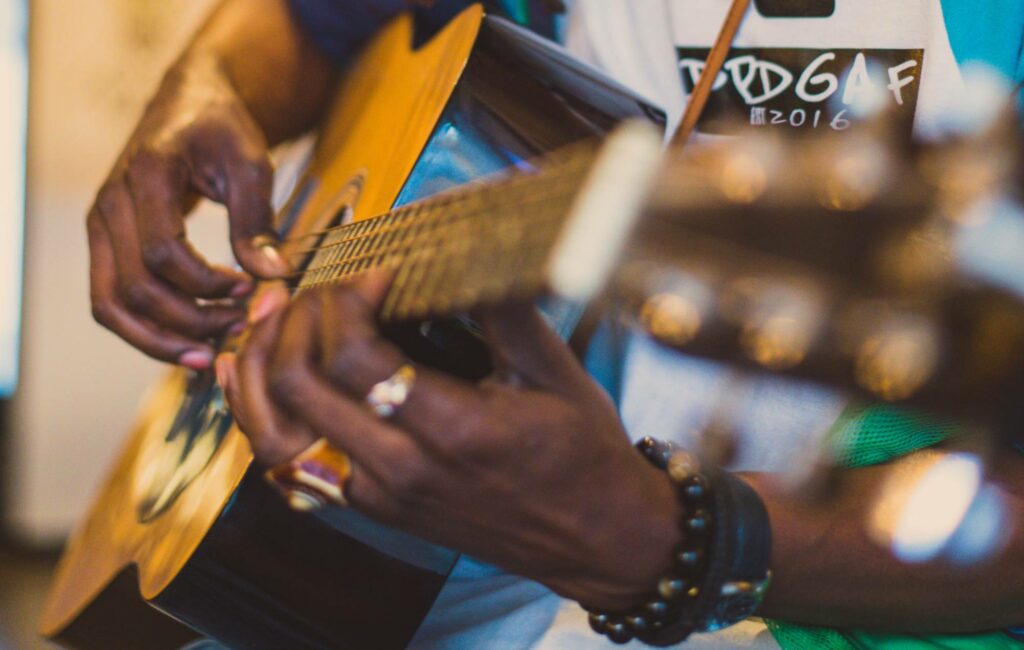 A man plays guitar