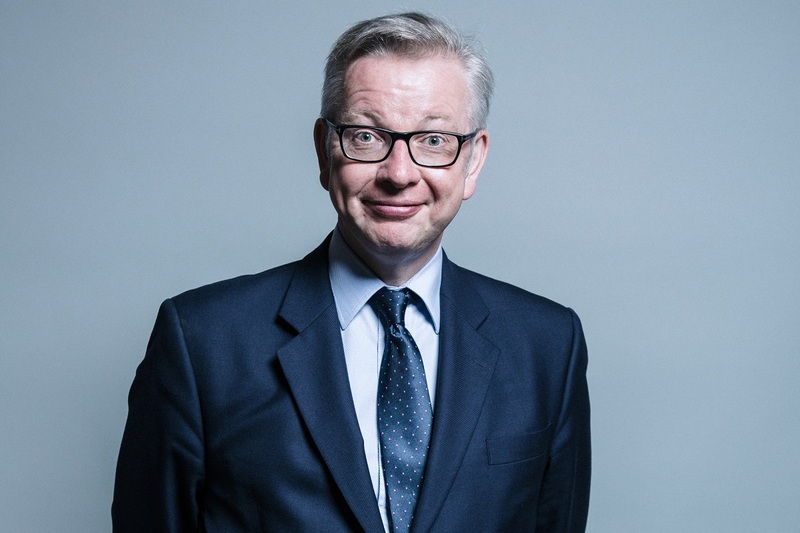 Michael Gove poses for an official parliamentary portrait