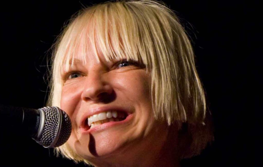 Sia performs live without wearing her signature wig