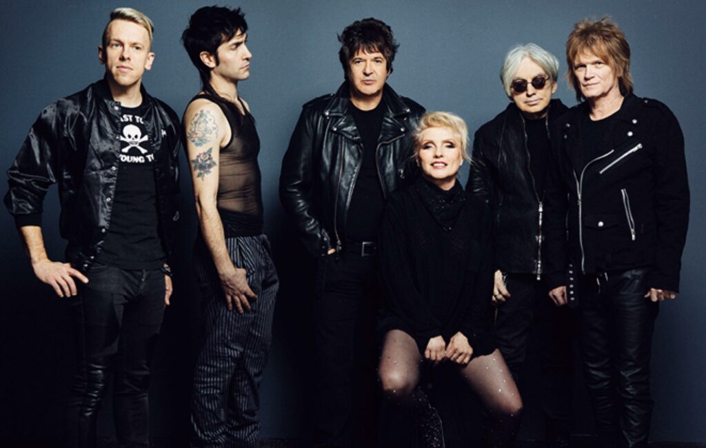 Members of the band Blondie pose in a 2022 press shot