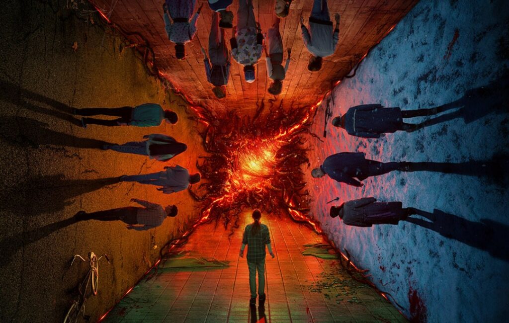 a crowd of character stand around a four dimensional portal in the poster for Stranger Things 4
