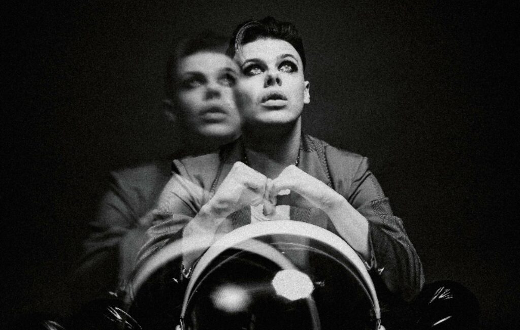 Yungblud poses in a black-and-white portrait