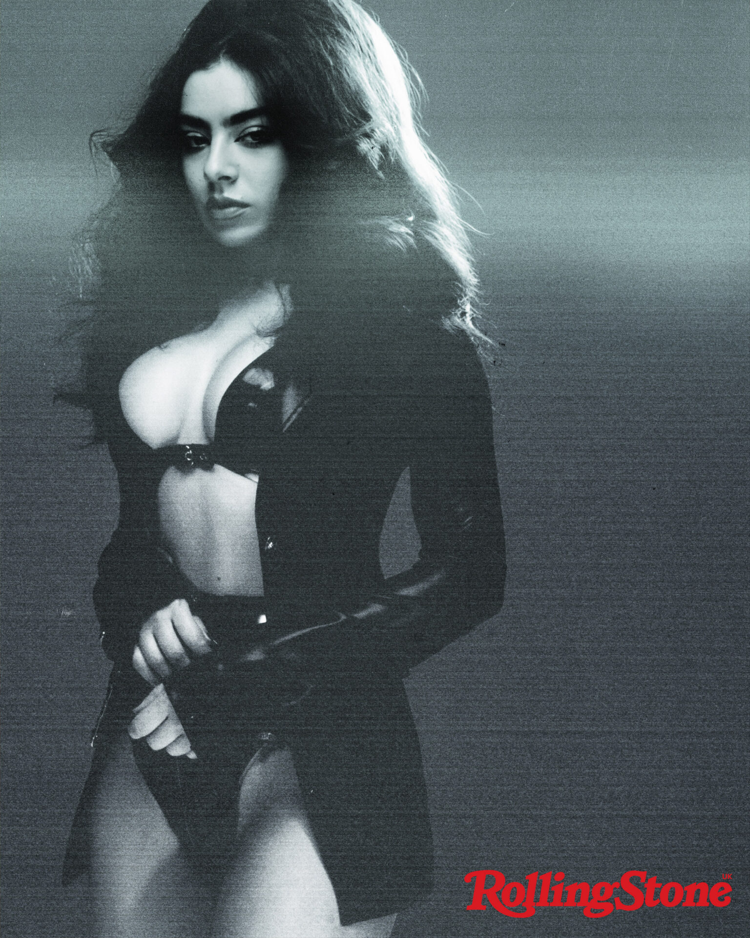 Charli XCX wears jacket by Versace, bikini set by House of Harlot (Picture:...