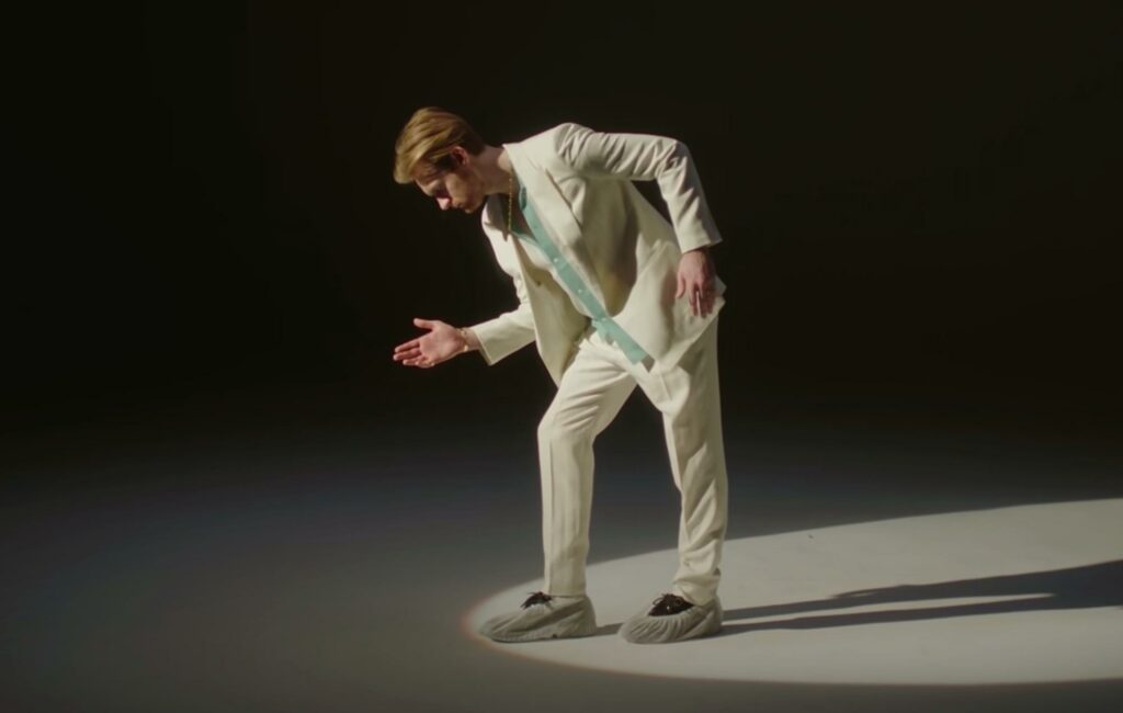 Finneas is seen dancing in the music video for 'Naked'