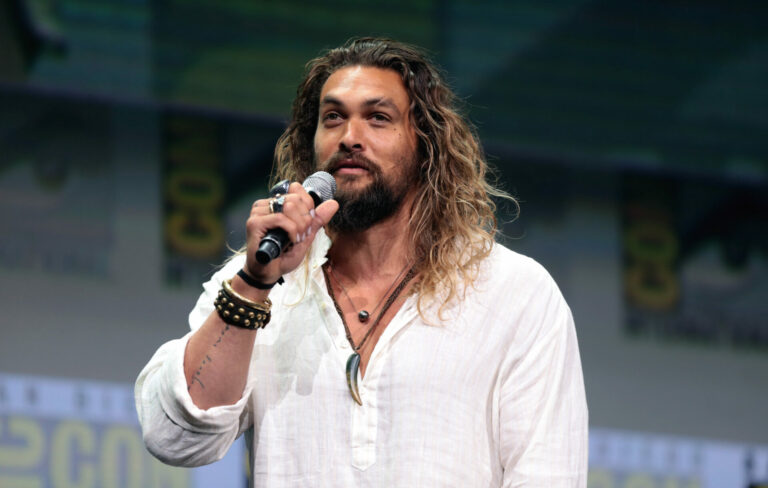 Jason Momoa speaking at a ComicCon event