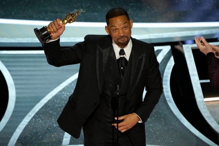 Will Smith accepts the award for best performance by an actor in a leading role for "King Richard" at the Oscars on Sunday, March 27, 2022, at the Dolby Theatre in Los Angeles.