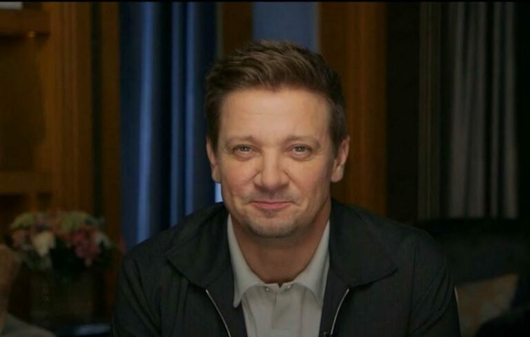 Jeremy Renner appearing on a talk show