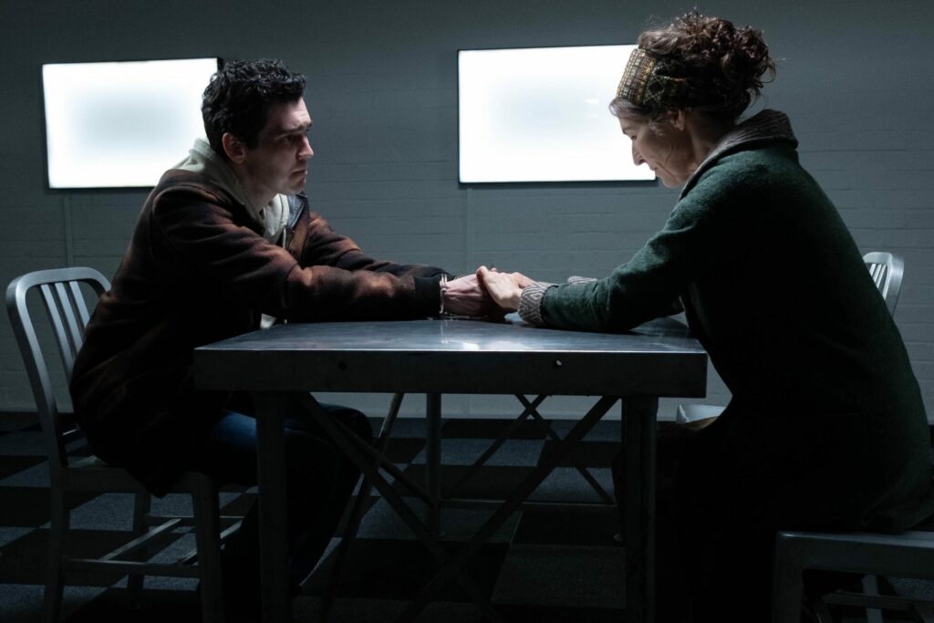 Jack Rowan appears as Callum and Helen Baxendale appears as Meggie  together in a scene from Noughts + Crosses series two