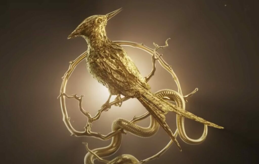 A gold plated bird and snake from 'The Hunger Games: The Ballad of Songbirds and Snakes' teaser