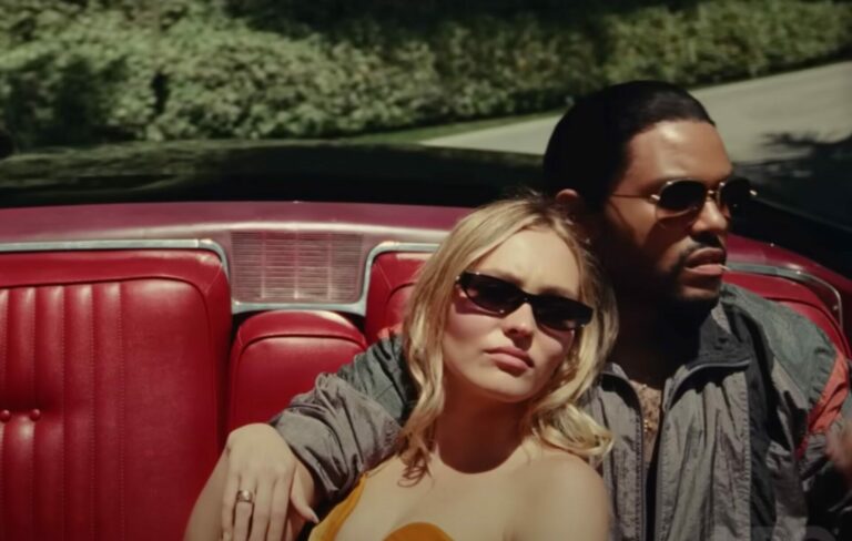 Lily-Rose Depp and The Weeknd drive in an open top car in in the trailer for 'The Idol'
