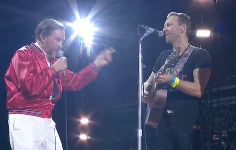 Steve Coogan performing as Alan Partridge with Coldplay at Wembley Stadium in London