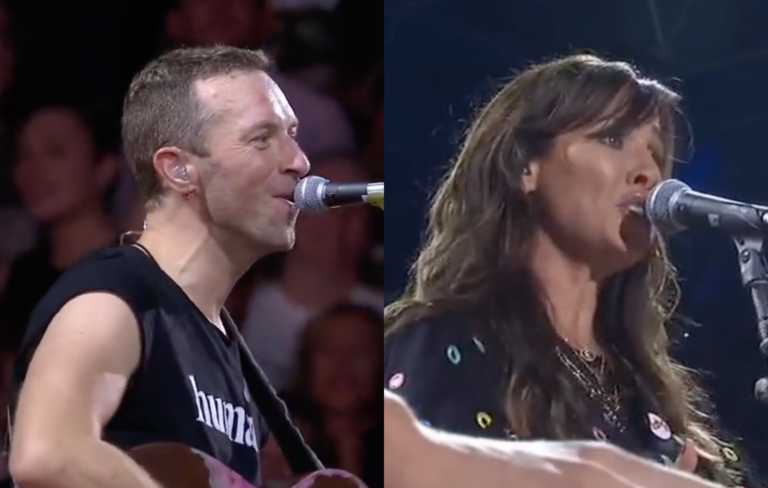 Chris Martin of Coldplay and Natalie Imbruglia perform together at Wembley Stadium