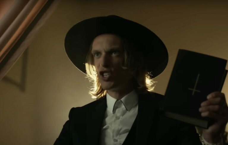 Jamie Campbell Bower in the official video for his new single 'I Am'