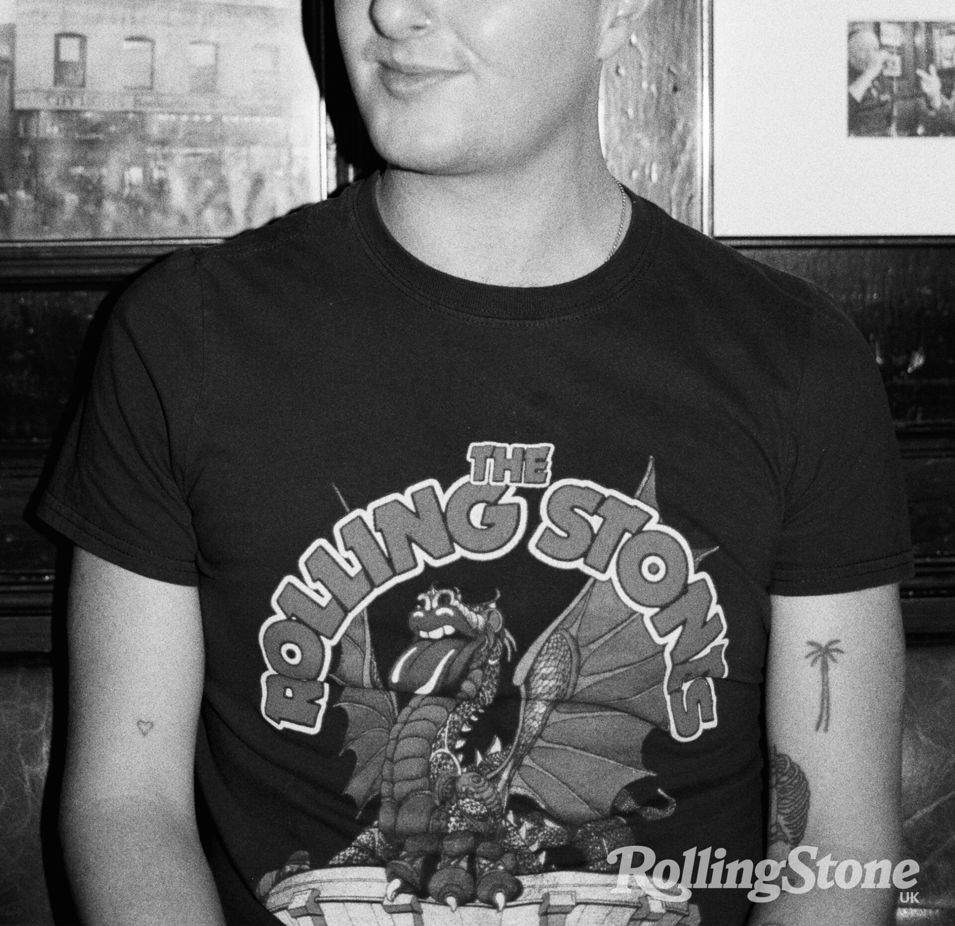 A photograph of pop singer Joesef wearing a Rolling Stones t-shirt at a pub