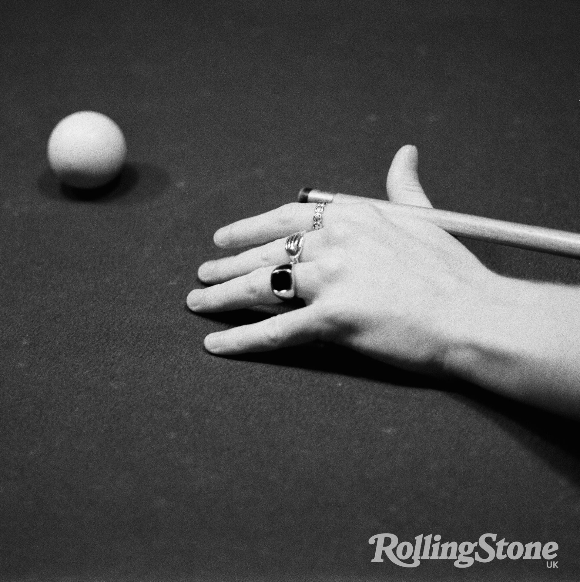 A photo of pop singer Joesef playing pool