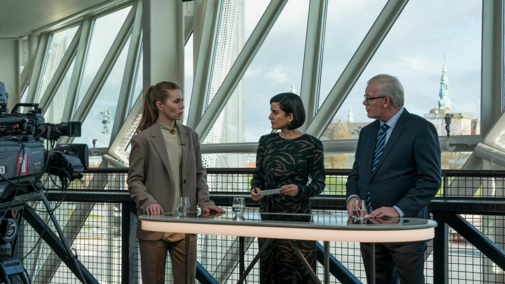 A still of three characters stood together in ‘Borgen’