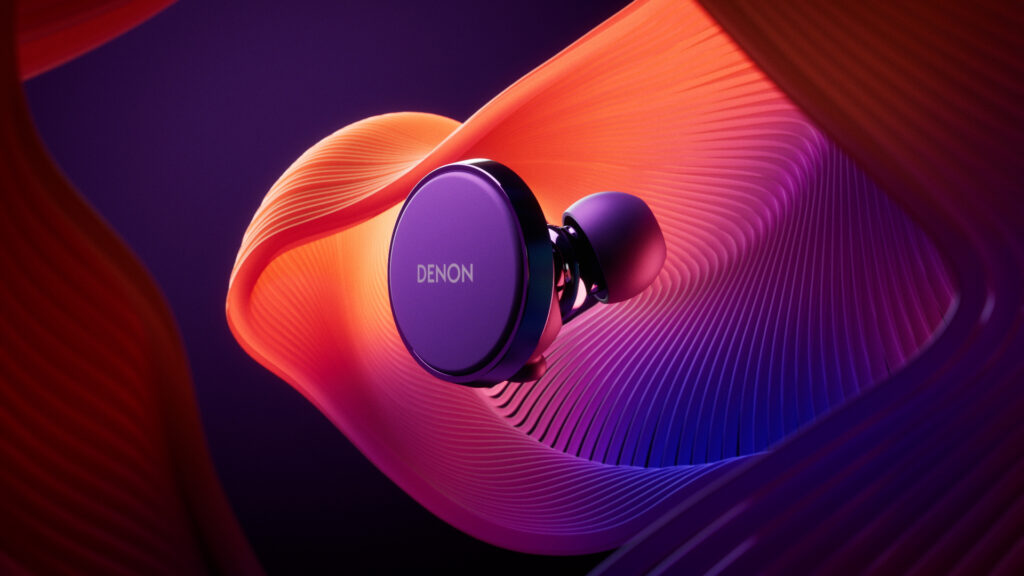 Stylised photo of Denon headphones with a colourful geometric background