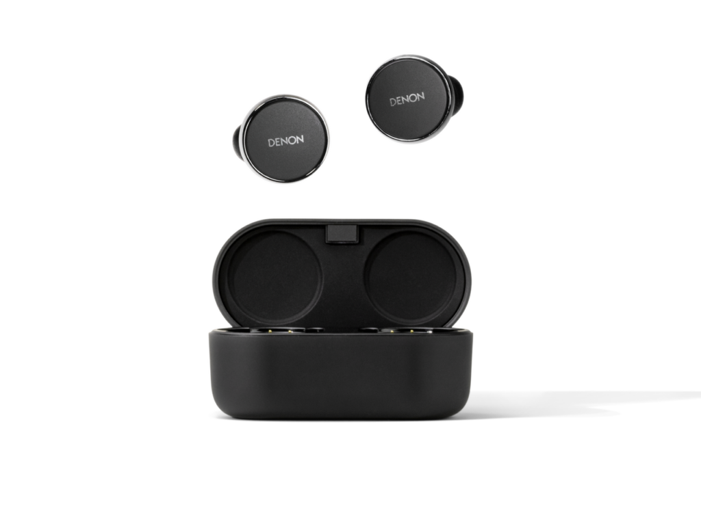 Product shot of some black wireless earbuds from Denon with a charging case