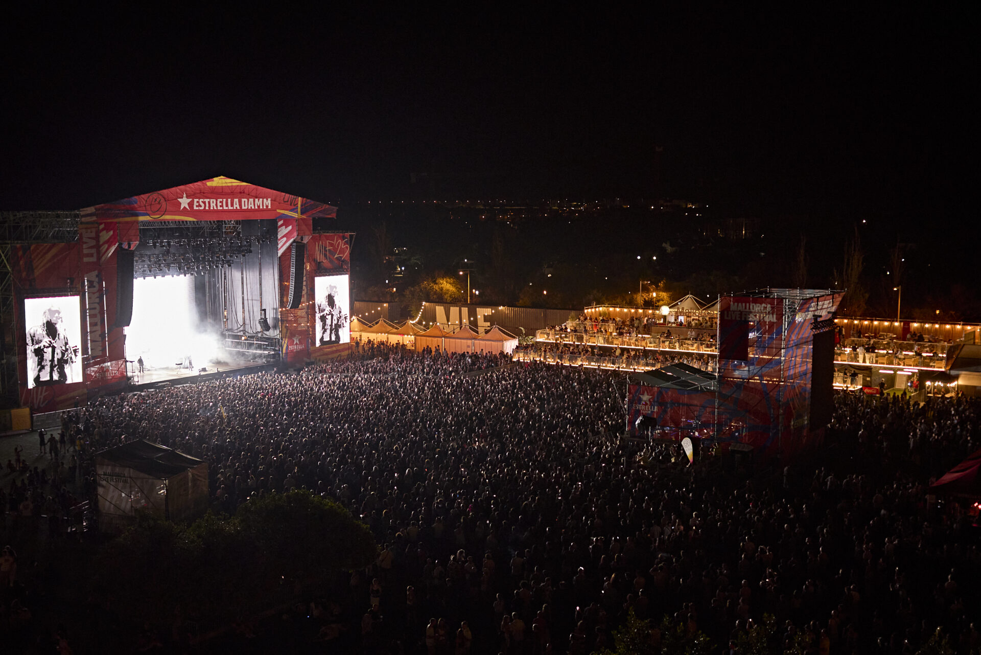 A large crowd gathered at night in front of the main stage at Mallorca Live Festival 2025.