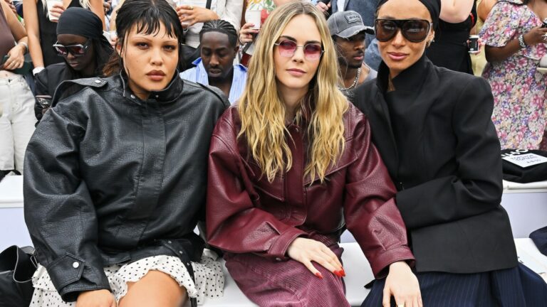 Models Alva Claire, Cara Delevingne and Adwoa-Aboah sitting front row at the Top Shop Autumn/Winter 2025 fashion show held at Trafalgar Square in London.