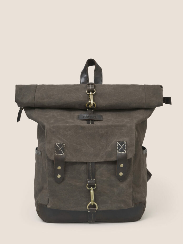 Product image of Gandys' Sri Lanka Backpack. A chestnut brown bag with a roll-top. 