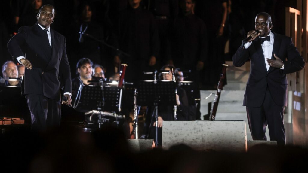 Musician Clipse wears Louis Vuitton menswear at the Grace for the World concert in St. Peters Square.